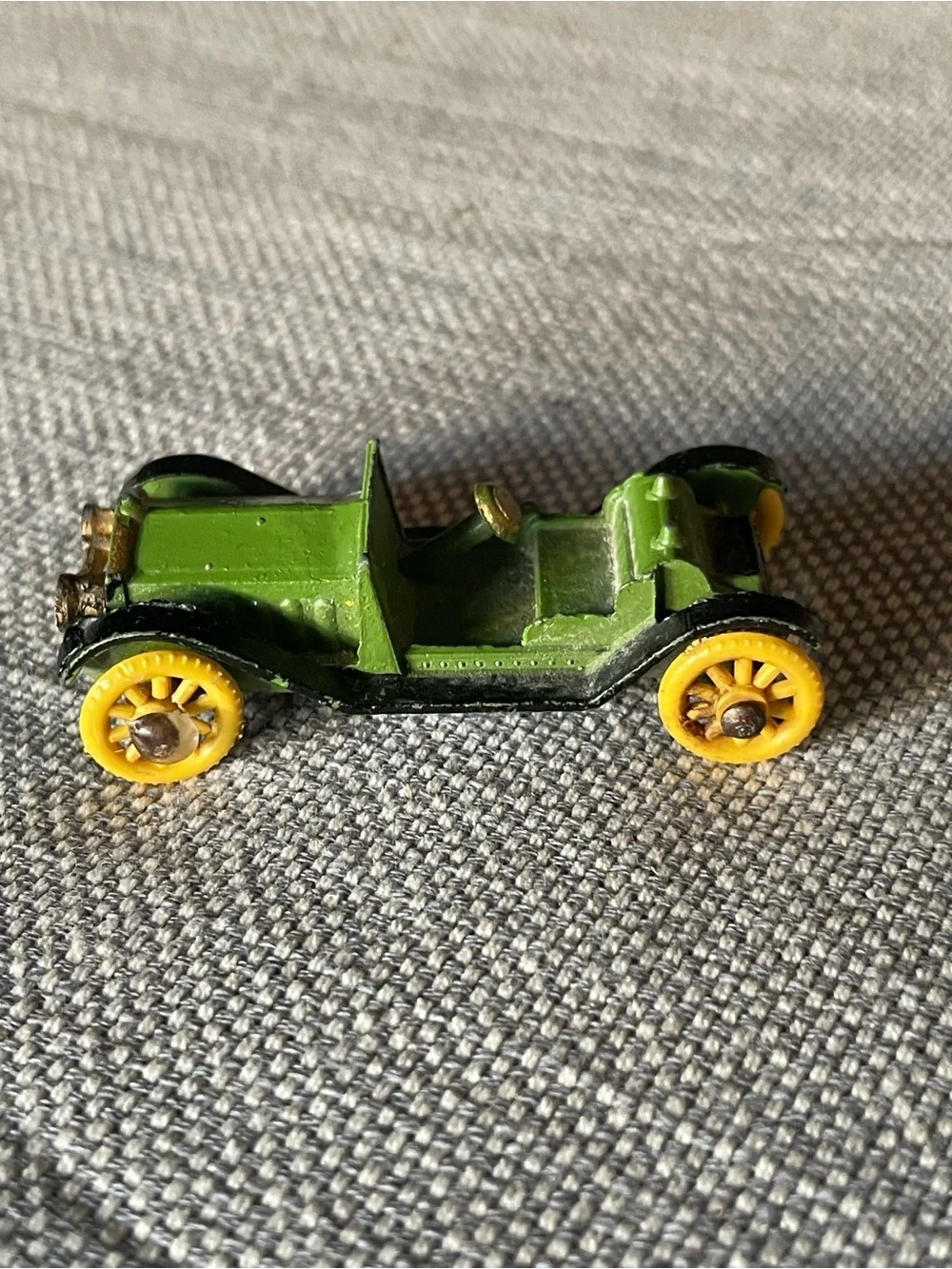 Vintage metal diecast car, made in England stamped on the bottom